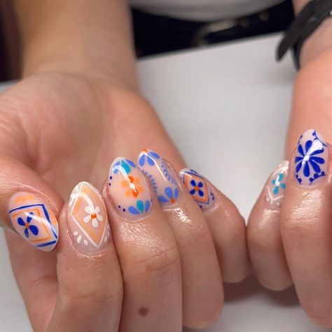 Channeling the vibrant spirit of Mexican pottery with these intricate nail designs. Each pattern tells a story, bringing a touch of culture and artistry to your fingertips. 🌸✨ #MexicanPottery #NailArt #HandPaintedNails #CulturalBeauty #NailInspo #ArtisticNails #BrightAndBold #NailDesign #NailTech #ColorfulNails @lianakorber Latin Nail Designs, New Mexico Nails, Spanish Inspired Nails, Mexican Independence Day Nails, Mexico Nails Vacations, Quilt Nails, Mexican Inspired Nails Mexico, Mexico Inspired Nails, Intricate Nail Designs