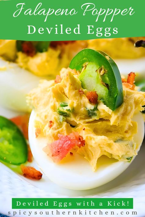 Close-up of a deviled egg topped with a jalapeno slice. Jalapeno Popper Deviled Eggs, Crab Deviled Eggs, Angel Eggs, Cream Cheese Jalapeno, Shrimp Deviled Eggs, Jalapeno Deviled Eggs, Spicy Deviled Eggs, Bacon Deviled Eggs, Deviled Eggs Classic