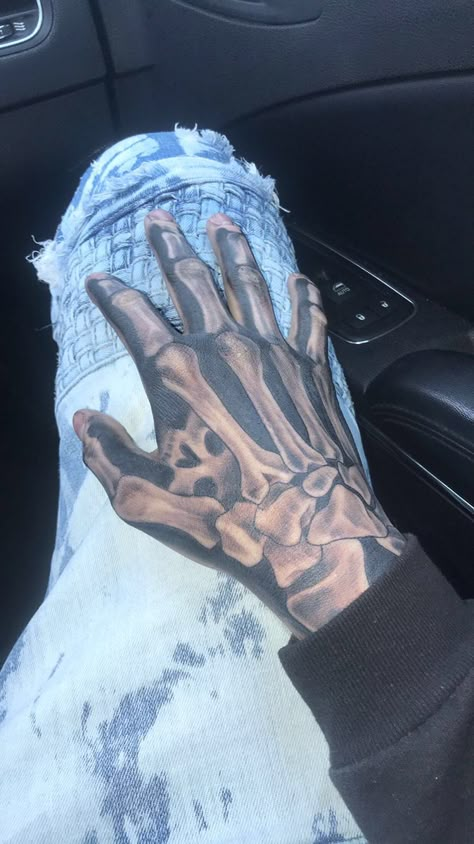 Skeleton Tattoo For Men, Skelton And Hand Tattoo, Trap Tattoos Men Hand, Hand Tattoos For Guys Men Design, Skeleton Tattoo Hand Men, Rare Tattoos Men Sleeve, Hand Tattoos For Black Men, Black Men Hand Tattoos, Skeleton Hand Tattoos For Guys