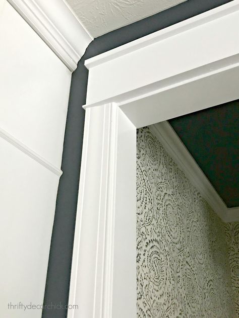 The little hallway that could! (With wallpaper, paint and trim.) from Thrifty Decor Chick Farmhouse Trim, Door Header, Gallery Wall Hanging, Craftsman Trim, Craftsman Door, Wallpaper Paint, Thrifty Decor Chick, Header Design, Thrifty Decor