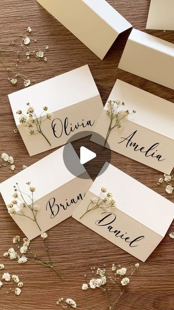 Pressed Flowers For Wedding Decor & Crafts | Cards & Frames on Instagram: "White Baby's breaths are timeless classic.🕊️ Beautifully incorporated into the placecards together with names crafted with Cricut.  Elevate your celebration with my pressed Baby's Breaths placecards. DM or Link in bio.♥️ . . . #pressedflowers#pressedflowerart#gypsophila#babysbreath#classic#weddingwaxseal#weddinginspiration #weddingideas#placecards#weddinginspo #weddingdiy#bridetobe#bride2024#ukbride#craftideas#diy#diyideas#weddingdecor#partyideas#babyshowerdecorations#bridalshowerdecor#bridalshowerideas" Pressed Flower Name Card, Diy Wedding Name Cards, Diy Name Tags Wedding, Diy Name Place Cards, Gypsophila Wedding Table, Name Cards For Table, Wedding Place Card Ideas, Diy Name Cards, Table Cards Wedding