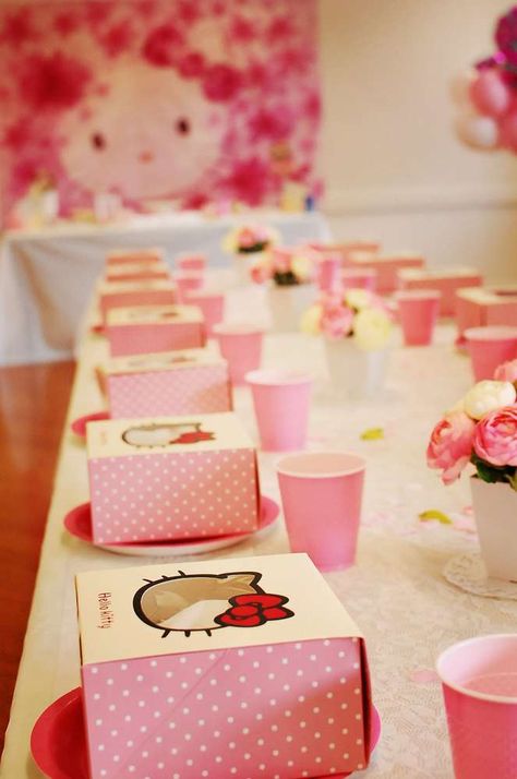 Elizabeth's Hello Kitty Birthday Party | CatchMyParty.com Hello Kitty Party Activities, Hello Kitty Party Games, Hello Kitty Table Decorations, Sanrio Birthday Party Decorations, Hello Kitty Centerpiece Ideas, Kitty Birthday Decorations, Hello Kitty Birthday Party Decorations, Hello Kitty Favors, Birthday Party Ideas Themes