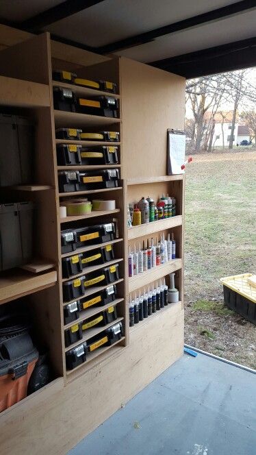 Each bin is grouped for a category of hardware or fasteners such as deck screws (all sizes), Cabinet (pocket hole, 2-1/2" cabinet, 5/8" drawer screws, etc.) Plumbing, Anchors, BLUM hinges, roofing nails, etc. ... Arbejdsplads Garage, Work Truck Storage, Diy Garage Storage Ideas, Van Organization, Van Shelving, Trailer Organization, Work Trailer, Garage Storage Ideas, Garage Organization Tips