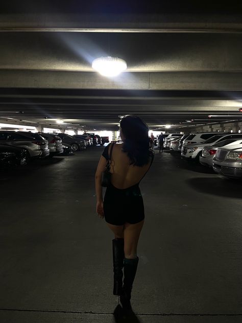 Black romper. Black boots. Fall outfit. Transitional outfit. Black outfit. Parking garage picture inspo. Parking Garage Photoshoot Two People, Car Garage Aesthetic Pictures, Instagram Poses Parking Garage, Photo Shoot In Parking Garage, Car Park Photo Ideas, Garage Inspo Pics, Nighttime Parking Garage Photoshoot, Ig Inspo Pics Parking Garage, Garage Aesthetic Pictures