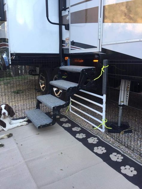 Rv fence under stairs Dog Area In Rv, Dog Area In Camper, Rv Fence For Dogs, Diy Rv Dog Fence, Camping Fence For Dogs, Rv With Dogs, Dog Fence For Rv Camping, Camping Dog Fence, Rv Camping With Dogs