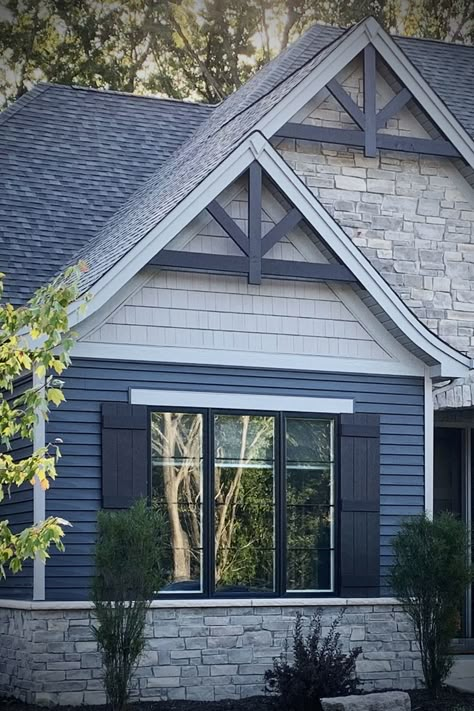 Exterior Home Decor On Siding, Exterior House Details, Blue Stone House, Blue House With Stone Accent, Two Tone Blue House Exterior, Blue House Blue Trim, Craftsman Style Shutters Exterior, Blue Home Exterior With Stone, Blue And Black Exterior House