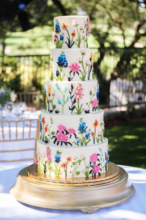 Vibrant Color Wedding Cake, White Cake With Colorful Flowers, Spring Garden Wedding Cake, Whimsical Garden Wedding Cake, Bright Floral Wedding Cake, Garden Themed Wedding Cake, Wildflower Wedding Cakes, Love Is In Bloom Cake, Wedding Cake Wildflowers