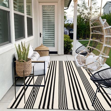 PRICES MAY VARY. Classic Striped Pattern: The Black and white outdoor rug features a classic striped design that gives it timeless style, featuring clean lines and a simple, adorn your floors and impresses your guests with a warm and inviting ambiance Front Porch Doormat: Layer rug this striped entrance doormat up with outdoor welcome mat(not included) to make elegant front door rug, they are heavy sturdy, offer a touch of your personality for your entryway and a greeting for friends and family Modern Farmhouse Rug, River Time, Porch Wall Decor, Yard Makeover, Porch Rug, Farmhouse Rug, Living Room Balcony, Balcony Furniture, Room Balcony