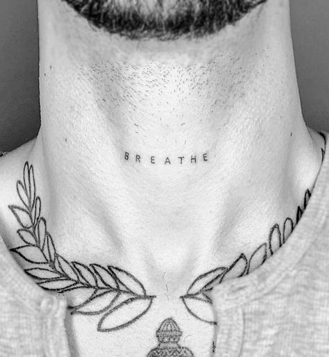 38 Small Meaningful Tattoos That Are Permanent Reminders Meaningful One Word Tattoos For Men, Neck Area Tattoo, Small Written Tattoos Men, Single Word Neck Tattoos, Word Throat Tattoo, Small Meaningful Neck Tattoos, Simple Tattoos Neck, Neck Tattoo Words Men, Neck Word Tattoo Men