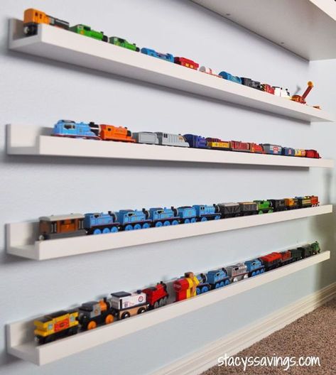 Jul 2, 2019 - Home organisation made easy! Love the picture ledges from IKEA for making storage both functional and pretty! Here's how to use them in any room. Toy Train Storage, Train Storage, Train Bedroom, Reading Nook Closet, Toy Trains Storage, Hot Wheels Storage, Toy Car Storage, Gray Room, Hot Wheels Display