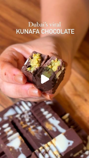 Thecrazyindianfoodie® - Mumbai on Instagram: "Dubai’s viral kunafa chocolate recipe! Save now!   You don’t need to spend thousands of rupees or travel all the way to Dubai to have these viral kunafa pistachio chocolates!   You can make them at home with this simple recipe. It tastes so good!😍   All you need is (for 3 bars or 1 bar and 12-13 pieces of chocolate) :   - 200 gms dark chocolate (use any like regular or compound, I prefer @amulindia chocolates).  - 200 gms milk chocolate (you can also use either one in 2x).  - 50 gms white chocolate (optional). - Edible glitter (optional).  - 150 gms unsalted, plain pistachios.  - 3-4 tsp condensed milk.  - 1 tsp butter.  - 1/2 cup seiveiyan (vermicelli) or kunafa.   How to melt chocolate? To melt the chocolate, roughly chop room temp chocolate Dubai Viral Chocolate, Dubai Viral Kunafa Chocolate Recipe, Pistachio Kunafa Chocolate Bar, Home Made Chocolate Recipe Easy, Kunafa Chocolate Recipe, Chocolate Kunafa Recipe, Dubai Kunafa Chocolate, Kunafa Chocolate Bar, Viral Dubai Chocolate Bar Recipe