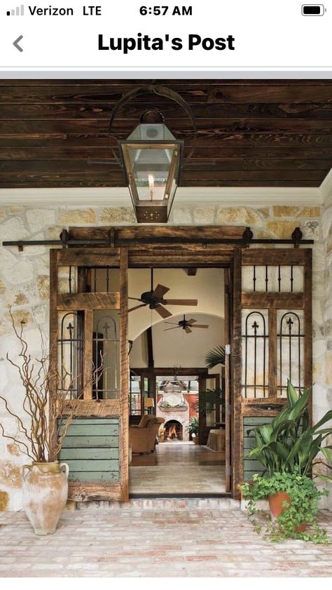 Porch Sliding Doors, Blue Front Doors, Porte In Ferro, Antique Brick, Reclaimed Wood Beams, Antique Lanterns, Casa Country, Stucco Exterior, Wrought Iron Fences