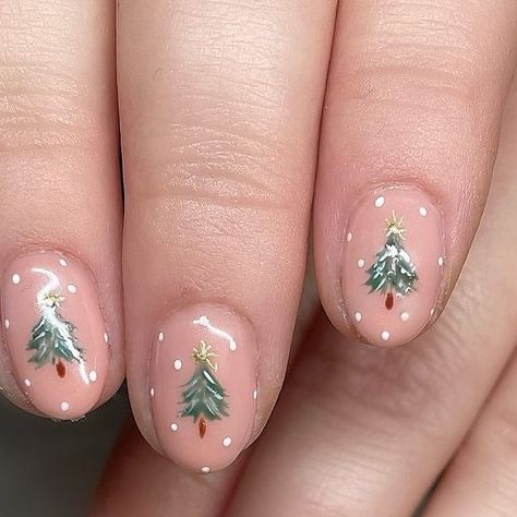 Isle Of Wight Nail Artist | Educator on Instagram: "Little Christmas Trees 🎄 Up early so am starting to sort through all the nails from this December, have had so much fun creating designs for you all. ❤️ Trees in the snow using @the_gelbottle_inc   Inspo: @_by_shelley  • #christmasnails #christmastreenails #nailart #scratchmagazine #scratchmag #decembernails #handpaintednailart #isleofwight #isleofwightnails #biab #buildergel #nudenails #negativespacenails #winteraesthetic #fashion #navyprofessional #hba2023 #nailitmag #zoella" Pink Nails With Christmas Tree, Christmas Natural Nail Designs, Tree Nails Christmas, Christmas Nails Inspo Short, Kids Nail Designs Christmas, Snowy Tree Nails, Christmas Tree Nail Art Designs, Pink Christmas Tree Nails, Winter Tree Nails