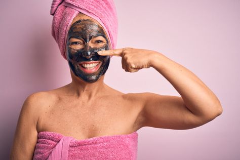 Lavender/pink wall with a woman smiling wearing a bath towel around her body and her hair pulled up into another towel pointing to her note with a charcoal face mask. Best Beauty Products, Facial Sunscreen, Anti Aging Ingredients, Gel Moisturizer, Anti Aging Serum, Spf Sunscreen, Simple Beauty, Aging Skin Care, Even Skin Tone