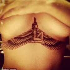 Rihanna sternum tattoo Rihanna Tattoo Chest, Tattoo Rihanna, Tattoos For Women On Thigh, Rihanna Tattoo, Henne Tattoo, Rihanna News, Underboob Tattoo, Goddess Tattoo, Egyptian Tattoo