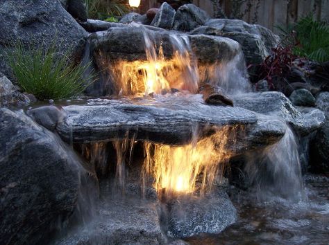 underwater lighting in a waterfall, electrical lighting, outdoor living, ponds water features, Double the impact or your water feature by adding lights for an after dark experience Outdoor Water Fountains, Underwater Lighting, Taman Air, Ideas For Garden, Outdoor Water Features, Waterfall Photo, Fountains Backyard, Garden Waterfall, Pond Waterfall