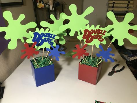 Double Dare Nickelodeon slime Party centerpieces - custom order from FavorSplash https://www.etsy.com/shop/FavorSplash Nickelodeon Double Dare Games, 90s Nickelodeon Party Decorations, Nickelodeon Decorations, Nickelodeon Party Decorations, Nickelodeon Birthday Party Ideas, Double Dare Party, Double Dare Birthday Party, 90s Nickelodeon Party, Obstacle Course Party