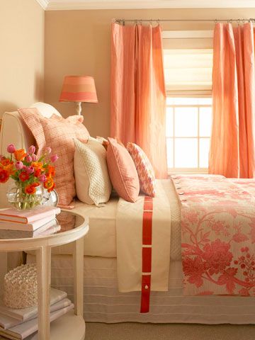 Salmon + Rose

    The warm color palette in this enchanting bedroom begins with the walls. Paint in a deep, dusty taupe with whispers of rose creates a feeling of intimacy, while salmon-color silk taffeta draperies define the window and add sheen. A floral duvet on the bed blushes in shades of pink that are echoed in the painted lampshade. Coral Bedroom, Orange Decor, Warm Colour Palette, Style At Home, Guest Bedrooms, Spring Home, Beautiful Bedrooms, Dream Bedroom, Home Fashion