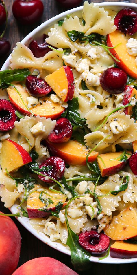 Cherry and Peach Pasta Salad with Arugula, Feta, and Honey-Lemon Salad Dressing - on a white plate. Peach Pasta Salad, Pasta Salad With Arugula, Salad With Cherries, Lemon Salad Dressings, Fruit Salad Ingredients, Stone Fruit Salad, Lemon Salad, Pasta Salad Dressing, Fresh Cherry