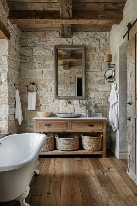 Use these tips to refresh your bathroom floor and give it a bit of style. Stone House Flooring, Patina Farm Bathroom, Farmhouse Bathroom Brick Floor, Rustic Herringbone Floor, River Stone Bathroom, Natural Stone Tile Bathroom Shower Walls, Wood And Stone Bathroom Ideas, Rustic Tiles Bathroom, Tumbled Travertine Bathroom