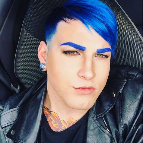 Dark Blue to Neon Blue melt and Skin Fade. #menshair #menwithtattoos #men #trending #trendinghair #bluehair #melting #melt #ombre #eyebrows #eyebrowsonfleek #fade #undercut #barber #blueeyebrows #makeup #boyswithmakeup #menscuts #menscolor #haircolor #pravana #pravanavids #customcolor #blue #neonblue #contour #makeupartist #AYmua #MAC #Lorac #NYX #cosmetics #trendingbeauty #rainbow #rainbowhair #mermaid #mermen #mermaidhair Dark Blue Hair Color Men, Teal Hair Color Men, Men Blue Hair Color, Blue Dyed Hair Men, Electric Blue Hair Ombre, Men’s Vivid Hair Color, Fade Undercut, Ombre Eyebrows, Skin Fade