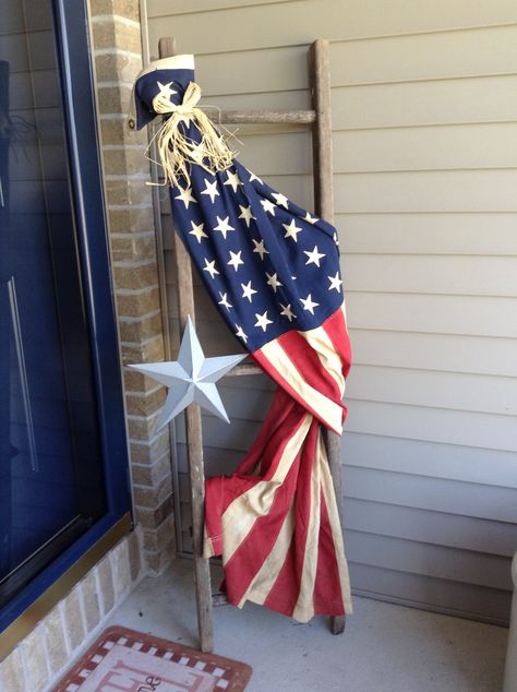 Flag draped on a ladder. Front Porch Flag, Wood Ladder Decor, Veterans Day Decorations, Old Wood Ladder, Porch Flag, Americana Crafts, Memorial Day Decorations, Church Altar, Flag Crafts