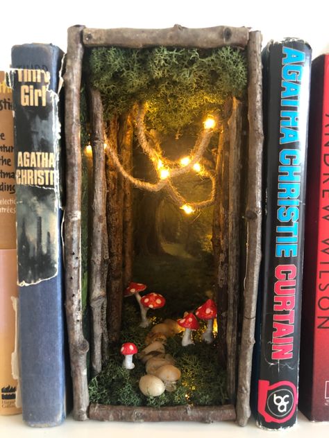 A book nook shelf insert that gives the illusion of a miniature fairy forest with mushrooms and a pebbled path between your books. Anting Manik, Bookshelf Art, Diy Crafts To Do, Book Nook, Book Case, Fun Diy Crafts, Book Nooks, Cute Crafts, Crafts To Do