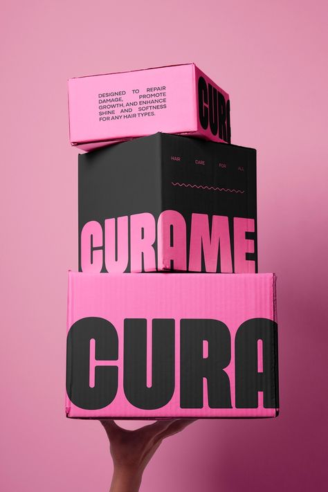 Curame is a high-quality hair care brand dedicated to restoring and  revitalizing all hair types. With a vibrant and youthful aesthetic characterized by bold pink and black colors, Curame offers a range of nourishing shampoos, oils, hair masks, and many more. The products are designed to repair damage, promote growth, and enhance shine and softness, all while maintaining a clean, sleek, and fun image. Pink And Black Packaging, Branding And Packaging Design, Hair Wax Packaging Design, Hot Pink Graphic Design, Pink Black Branding, Edgy Packaging Design, Bold Product Design, Hair Care Branding Design, Bold Luxury Branding