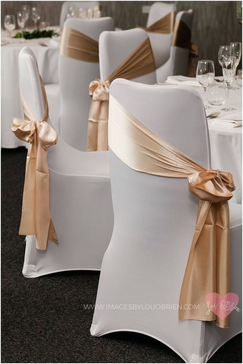 Chair Covers With Sash, Cover Chairs For Wedding, Covered Wedding Chairs, Chair Decor Ideas Wedding, White Covered Chairs Wedding, Wedding Guest Chair Decor, Chair Sash Tie Ideas, White Chair Covers With Gold Sash, Chair Ties Ideas