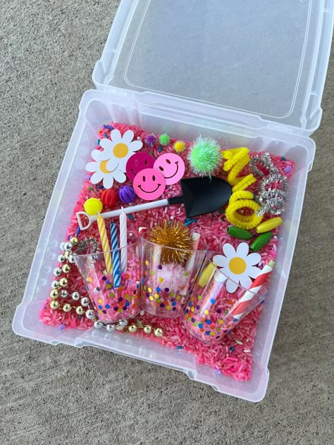 Rice Sensory Kit 💕Handmade colored rice.  💕Each kit may very slightly from kit to kit.  💕 Great part of a rice sensory kit is that it never goes bad, unlike play dough.  💕Bags: Kit comes in a clear fronted zip bag, 1 cup of colored rice, & the same sensory play filler.   💕Bins: Kit comes in a 6x6 plastic box with an attached lid for easy set up and clean up, 1.5 cups of colored rice, & the same sensory play filler.  💕Small parts, could be a chocking hazard for small children 3 years old and younger. Children should use these kits under adult supervision. 💕Can make a custom kit of your choosing. Just send me a message.  💕Spend $35 or more and get free shipping in my shop.  ❤️ Thank you for supporting my small business. Birthday Sensory Bin, Ice Cream Sensory, Raising Wildflowers, Sensory Kits, Sensory Dough, Sensory Crafts, Activity Box, Playdough Kits, Colored Rice