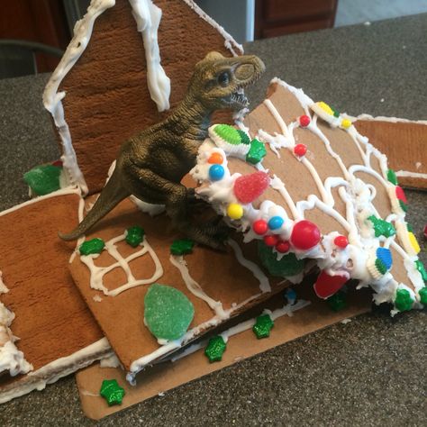 Dinosaur gingerbread house Holiday Quotes Funny, Homemade Gingerbread House, Gingerbread House Ideas, Gingerbread House Parties, Gingerbread House Designs, Gingerbread House Decorations, Christmas Gingerbread House, Holiday Humor, Christmas Gingerbread