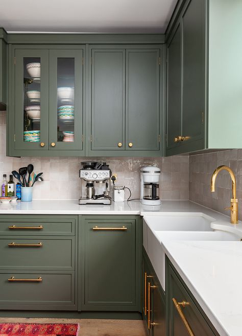 Read all about this bespoke kitchen project we completed in Notting Hill with sage green cabinetry, brass hardware and the most stunning walk-in pantry/still-room! #bespokekitchens #herringbonekitchens #bespokecabinetry #greenkitchens #brasstap #boilingwatertap # belfastsink #doublesink #ceramicsink #paintecabinetry #paintedkitchen #tiledkitchen #tiledsplashback Sage Kitchen, Green Kitchen Designs, Sage Green Kitchen, Green Kitchen Cabinets, Green Cabinets, Kitchen Farmhouse, Kitchen Cabinet Colors, Kitchen Inspiration Design, Kitchen Diner