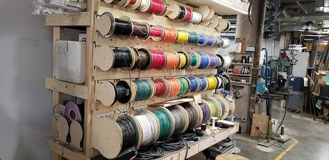 Wire spool rack idea - Space and infrastructure - VHS Talk - Vancouver Hack Space Cleat Storage, Spool Storage, Wire Spools, Wire Spool, Spool Holder, Wire Racks, Storage Systems, Wire Storage, Wooden Spools