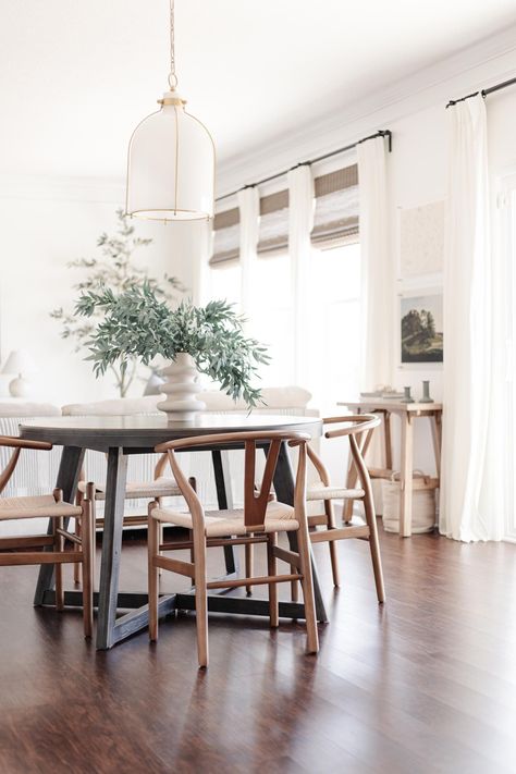 Round Dining Table Wishbone Chairs, Breakfast Area Table And Chairs, Pendant Over Round Table, Round Table Wishbone Chairs, Round Table Pendant Light, Eat In Kitchen Round Table, Round Dining Table Lighting, Round Breakfast Table Ideas, Table With Wishbone Chairs