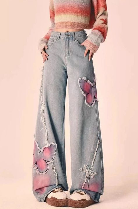 Rock these Distressed Pink Butterfly Jeans 🦋 and make a statement with their unique distressed design. These cute and pretty jeans feature edgy pink butterfly designs that will surely turn heads. Be bold and playful with your fashion choice! Size Chart: Size Waist (cm) Hip (cm) Length (cm) Waist (in) Hip (in) Length (in) S 63 94 100 24.80 37.01 39.37 M 67 98 101 26.38 38.58 39.76 L 71 102 102 27.95 40.16 40.16 XL 75 106 103 29.53 41.73 40.55 Description: Item Type: JeansJeans Style: High Waist Wide Leg PantsClosure Type: Zipper FlyMaterial: Cotton/LinenElasticity: Slight StretchLength: Full LengthFit Type: LooseDecoration: EmbroideryOrigin: CN Thickness: Regular Y2k Embroidery, Raw Edge Jeans, Pretty Jeans, Jeans Female, Jeans Streetwear, 2000s Clothes, Denim Decor, Retro Jeans, Streetwear Jeans