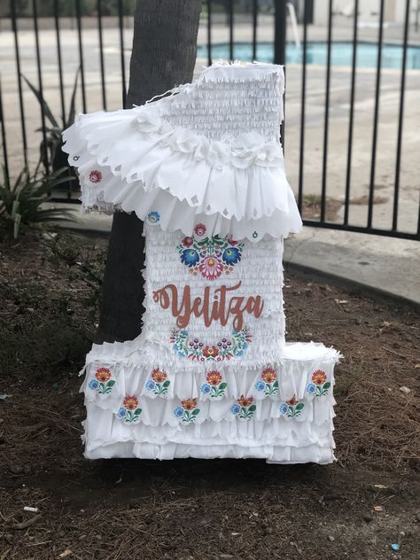 Fiesta themed Baptism Pinata, all white with mexican themed flowers added. All White Mexican Theme Party, Hacienda Baptism, Mexican Theme Baptism For Girl, Baptism Pinata, Mexican Baptism Ideas, Mexican Pinata, Baptism Decorations Girl, Mexican Themed Weddings, Mexican Birthday