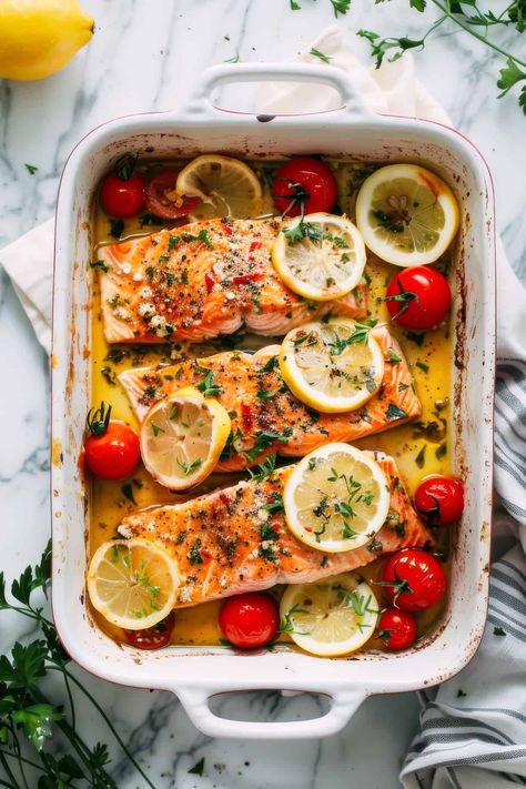 Whip up this baked Greek salmon on a sheet pan in just 30 minutes! Roasted cherry tomatoes and bright herbs come together for a healthy Mediterranean recipe your whole family will love. Save this pin for a fuss-free, flavorful dinner! Meditterean Salmon Recipes, Salmon And Cherry Tomatoes, Salmon Sheet Pan Dinner Healthy, Mediterranean Diet Salmon Recipes, Greek Salmon Recipes, Mediterranean Salmon Recipes, Whole Salmon Recipe, Salmon Recipe Healthy, Lasagna Party