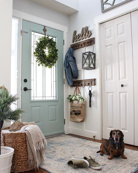 Sooooo, I know you guys have seen my foyer and front door many times before, but notice anything different?? I kinda made a change in this… Rustic Hallway Decor, Rustic Hallway, Apartment Entrance, Front Door Entryway, Apartment Entryway, Entryway Wall Decor, Diy Farmhouse Table, Front Door Entrance, Foyer Decorating