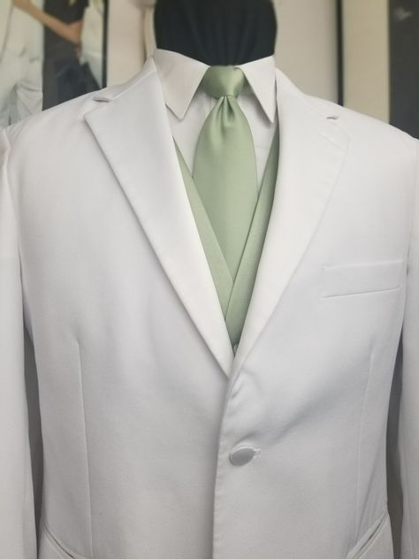 I love it. Mint green Sage Green Chambelan Outfits, Chambelan Outfits, Chambelanes Outfits, Quinceanera Themes Dresses, White Tux, Quinceanera Themes, White Suit, Mens Formal Wear, Green Vest