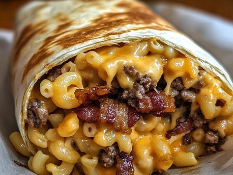 Imagine a dish that brings together the best of three comfort food classics: a juicy burger, creamy mac 'n' cheese, and crispy bacon. The Bacon Mac 'n' Bacon Mac And Cheese Burger Wrap, Mac And Cheese With Bacon, Mac And Cheese Burger, Burger Wrap, Hearty Snacks, Juicy Burger, Bacon Mac And Cheese, Cheese Wrap, Creamy Mac And Cheese