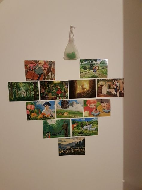 I tried decorating my wall with these cute postcards 🙂 Hanging Postcards On Wall, Ghibli Postcard Wall, Wall Decor Kawaii, Studio Ghibli Postcard Wall, Poster Organization Ideas, Handmade Poster Ideas, Studio Ghibli Postcard, Ghibli Postcard, Study Ghibli