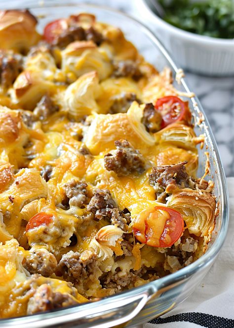 Whip up an effortless gourmet breakfast with our Overnight Croissant Breakfast Casserole! It combines flaky croissants, savory sausage, and rich cheese in a make-ahead dish that simplifies morning routines. Perfect for brunch or special occasions, it's a crowd-pleaser that leaves everyone asking for seconds. Prep tonight, bake tomorrow, and watch it disappear! Ready for a breakfast revolution? Save this recipe now and give your mornings a delicious upgrade! Easter Breakfast Casserole Overnight, Make Ahead Breakfast Crescent Rolls, Grand Marnier French Toast Casserole, Make Ahead Breakfast Croissant, Cheesy Sausage And Croissant Casserole, Sausage Breakfast Casserole With Croissant, Christmas Croissant Breakfast Casserole, Overnight Crescent Roll Breakfast Casserole, Overnight Breakfast Casserole Recipes