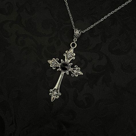 This richly detailed antiqued silver tone cross is accented with a Jet Black sparkling glass crystal. Pendant is 1 5/8" wide and 3 1/4" tall in (including bail).  Pendant comes with a soldered stainless steel cable chain in your choice of length. It closes with a lobster clasp and chain extender so you can adjust the length as needed. If you would like a different length, please send us a message. Matching cross earrings are listed separately in our store. If you would like this design in a diff Pink Shell Necklace, Victorian Vampire, Goth Necklace, Vampire Goth, Gothic Victorian, Choker Pendant, Chain Extenders, Jewelry Lookbook, Cross Earrings