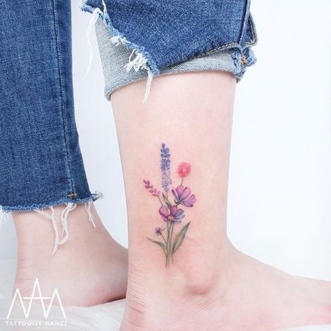 Floral Bouquet Tattoo on Ankle by Tattooist Nanci Wildflowers Tattoo, Flower Bouquet Tattoo, Ankle Tattoo Designs, Bouquet Tattoo, Foot Tattoos For Women, Tattoos For Women Flowers, Tattoo Rose, Disney Tattoo, Delicate Tattoo