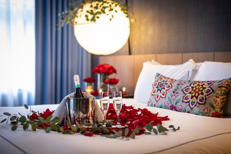 Make Your Valentine's Day Extra Romantic With This Chicago Hotel’s Rose Petal Packages Romantic Hotel Room Roses, Rose Hotel Room, Surprise Hotel Room For Her, Decorating Honeymoon Suite Romantic, Proposal Set Up Ideas Hotel Room, Hotel Room Anniversary Decoration, Hotel Room Romantic Rose Petals, Rose Petals Hotel Room, Honeymoon Room Decor