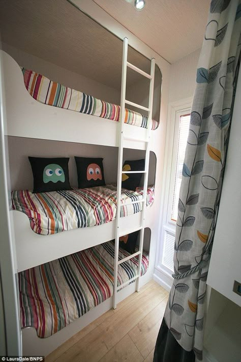 With fixed triple bunk beds on one end of the caravan and a sofa in the lounge doubling as a bed, what should be a six berth mobile home becomes one for nine people Rv Bunk Beds, New Mobile Homes, Beds Ideas, Triple Bunk Beds, Caravan Makeover, Triple Bunk, Caravan Renovation, Bunk Beds With Stairs, Bunk Bed Designs