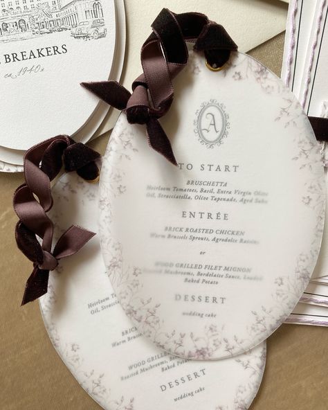 We are obsessed with this velvet ribbon twist holding the menu card and vellum cover together! Every bride and groom deserves a well designed, unique invitation suite and day-of paper goods, whether that would be for their wedding or another special occasion. ✨ What is your favorite dish on a wedding menu? Share your selection(s) in the comments! I’ll share mine there.😮‍💨 Ange xx Velvet Wedding Invitations, Wedding Place Settings, Menu Card, What Is Your Favorite, Wedding Place, Wedding Desserts, Menu Cards, Wedding Menu, Invitation Suite