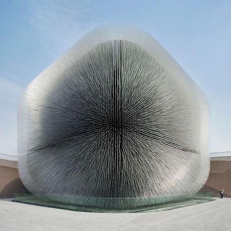 Inspired by this incredible building, which is actually a seed bank!  Click to discover the architect who used out-of-the-box thinking and the simplicity of one idea to create the Seed Cathedral, a piece of extraordinary architecture. #thomasheatherwick #seedcathedral #architecture #thesplashlab Memorial Architecture, Thomas Heatherwick, Architect Design House, Architectural Photographers, Unique Buildings, Structure Design, Sustainable Architecture, Architectural Inspiration, Concept Architecture