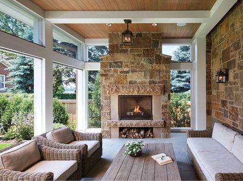 A cozy screen porch with a fireplace offers glimpses of Lake of the Isles. Screened Porch Designs, 3 Season Room, Porch Fireplace, Building A Porch, Sunroom Designs, Casa Country, Mill Valley, House With Porch, Porch Design