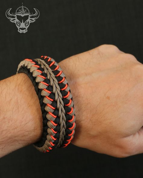 Modified Stitched Sanctified Paracord Bracelet . CORDS: Thundercloud Gray 550, Black 550 CENTER: Thundercloud Gray Type 1 STITCHING: Neon Orange MicroCord . #eastandbulldesign #paracord #bracelet #paracordbracelet #surferbracelet #handmade #handcrafted #handcraft Thundercloud Gray, Surfer Bracelets, Paracord Bracelet, 550 Paracord, Paracord Bracelets, Neon Orange, Paracord, Type 1, Stitching